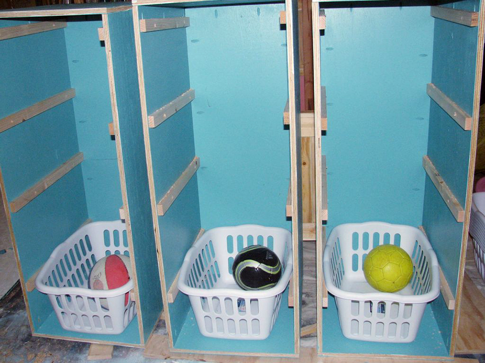 Painted DIY laundry basket dresser during construction