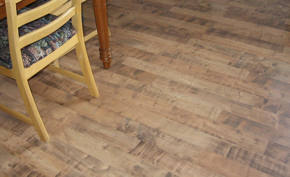 Low-maintenance laminate plank flooring