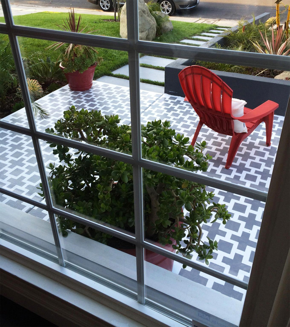 Gray and white painted concrete patio floor