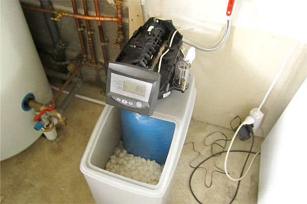 Water softener machine in a house