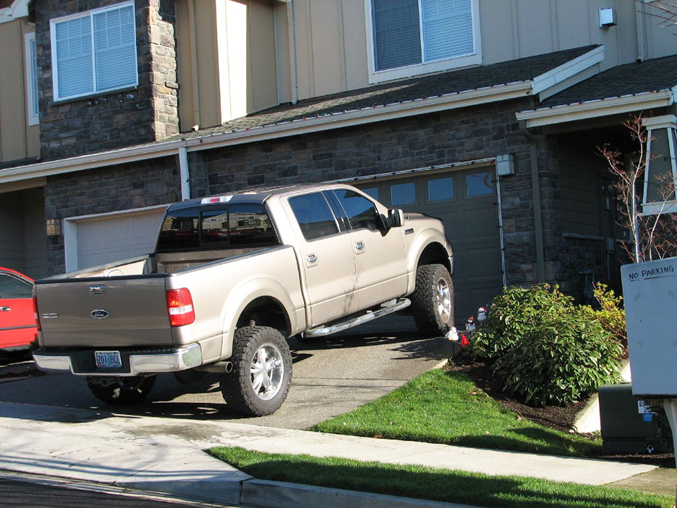 A truck that doesn't fit in a home's garage