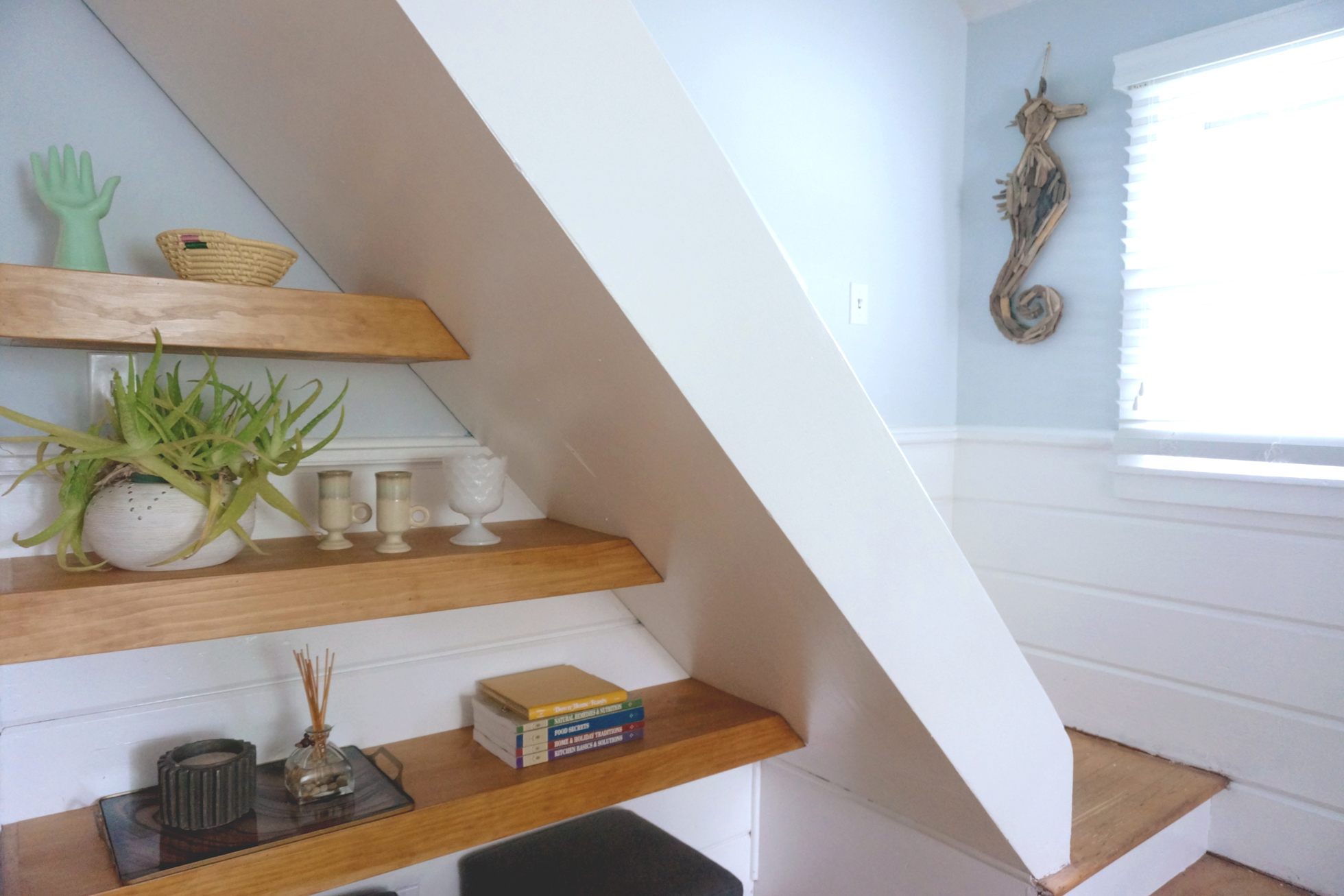 Wood shelving under stairs