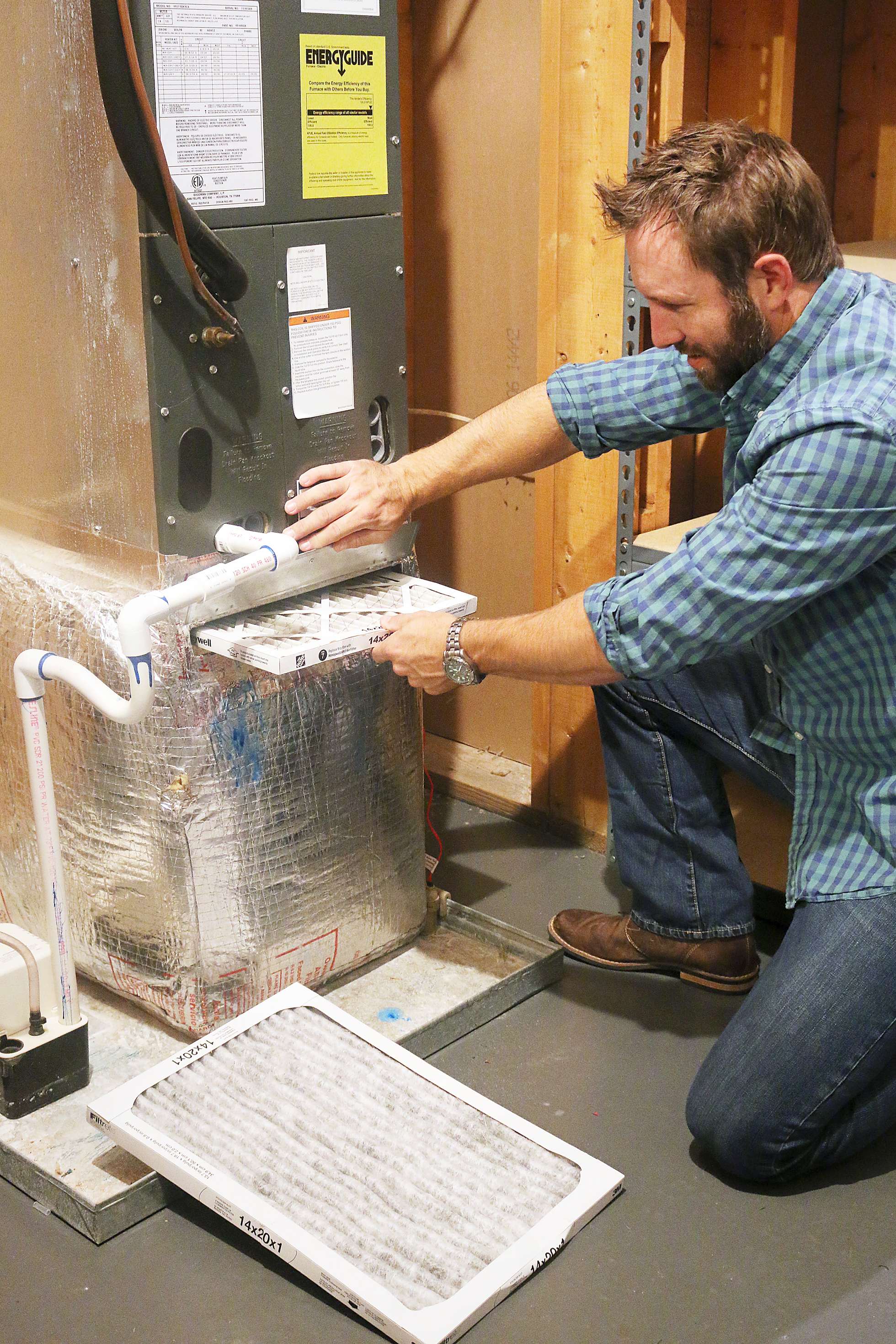 Man checking air filter