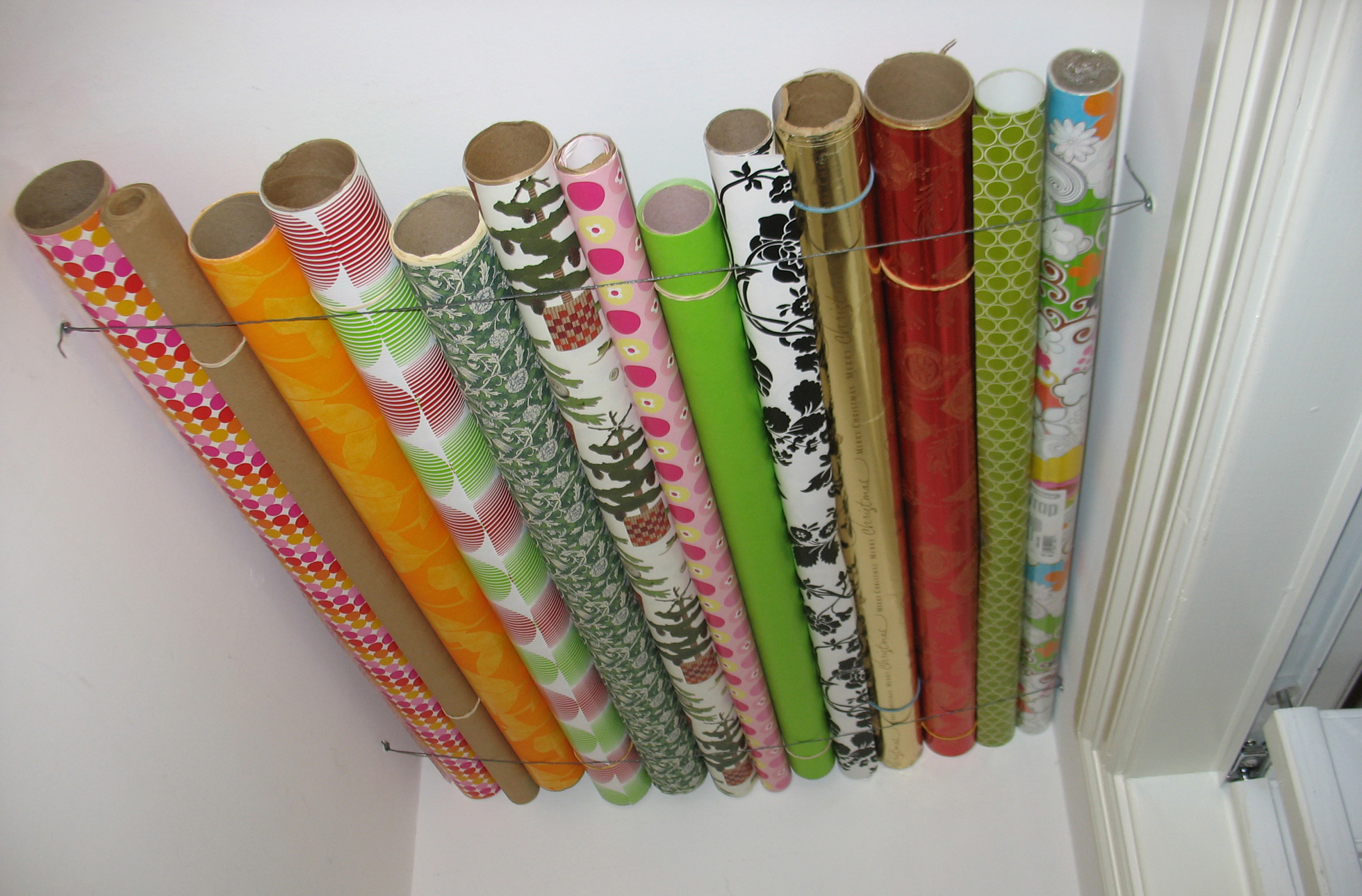 Wrapping Paper Stored on Closet Ceiling| Storage Solutions