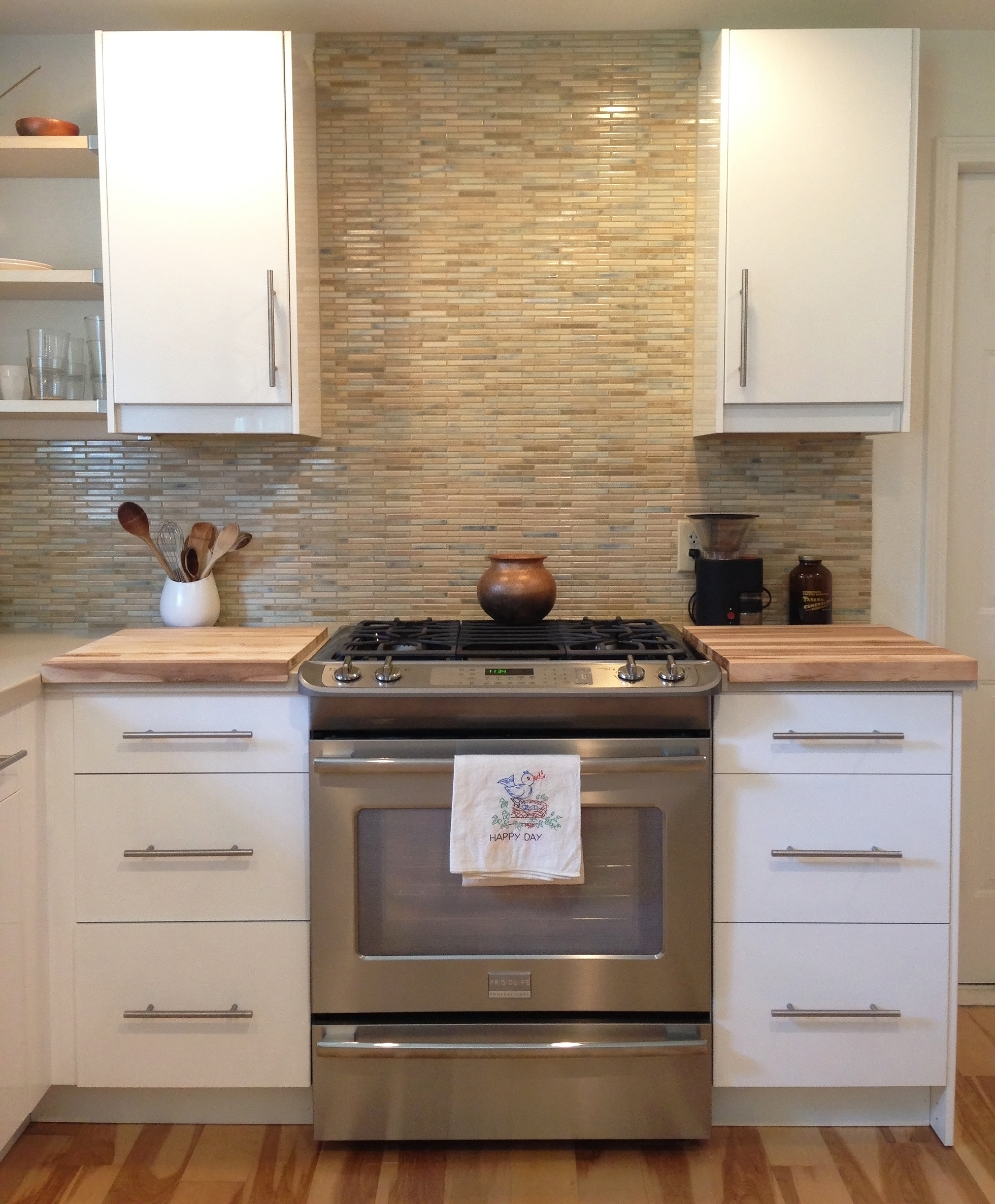White cabinets work nicely in a transitional style kitchen